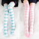 Long women's stockings with stripes above the knee - white-pink