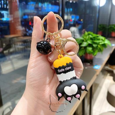 Keychain in the shape of a cat's paw with a bell - black