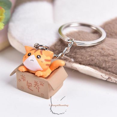 Keychain "cat in a box" - orange